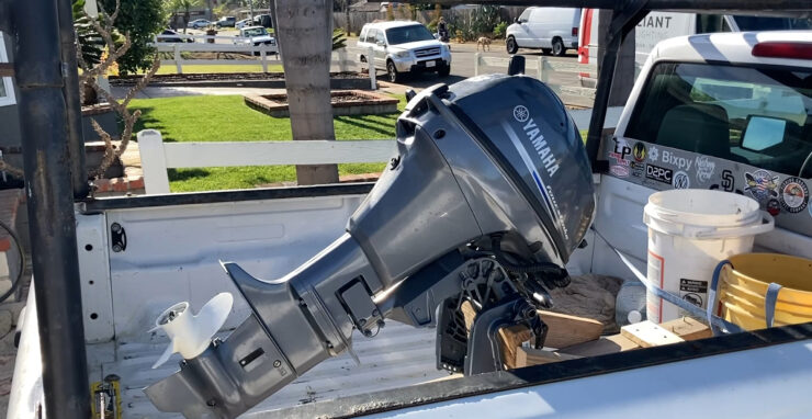 transport outboard motor in car