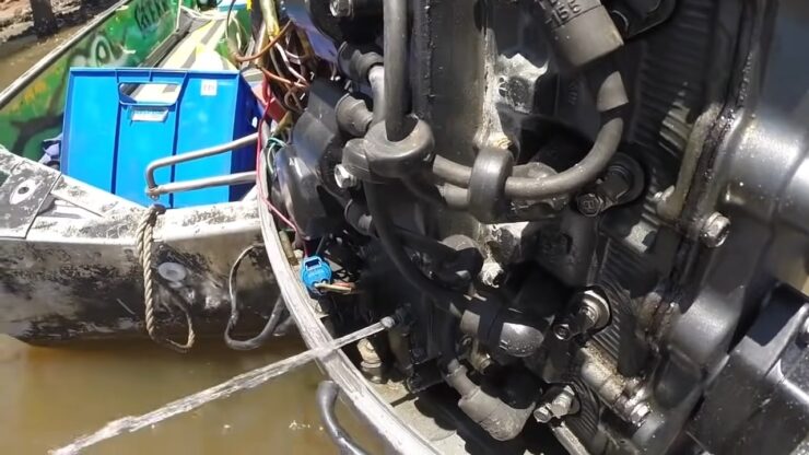 completely drain outboard motor 1